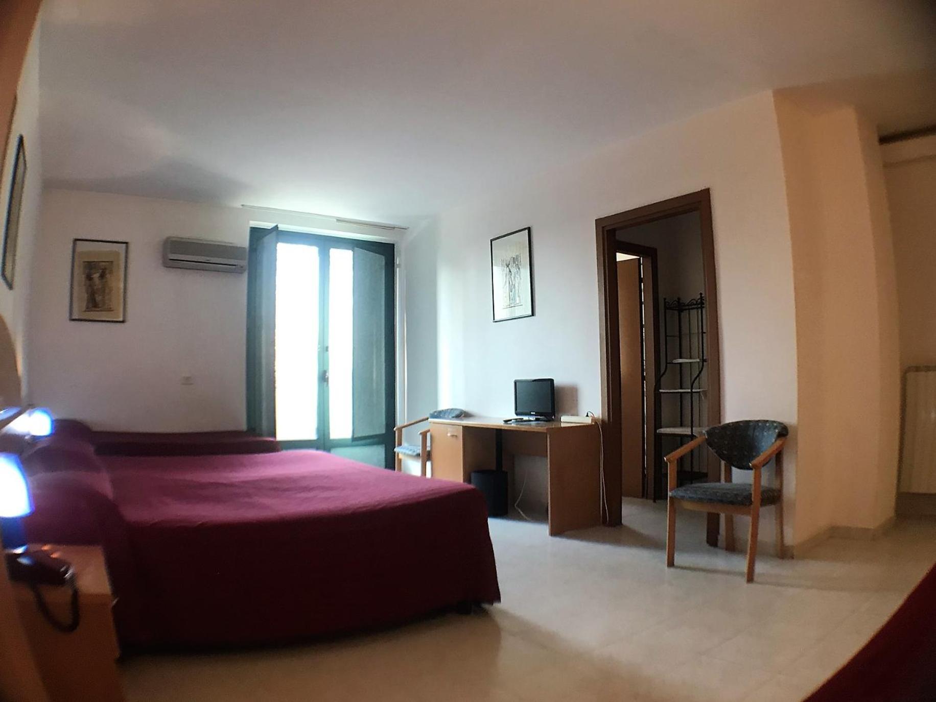 Ascot Lodging Cardano Al Campo Kamer foto